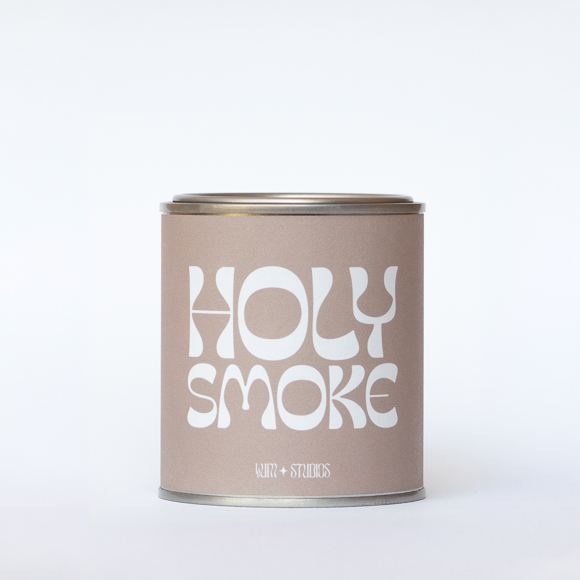 Llum Studios Holy Smoke vegan scented candle in a reusable tin with taupe sugarcane paper wraparound label, sustainably packaged and ethically made, on a white background