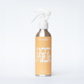 Llum Studios Hot Milk natural 150ml room mist in a sustainable aluminium spray bottle, warm yellow, ethically made, on a white background
